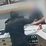 Extraordinary footage captures pub patrons fighting back against thief with gun, knife