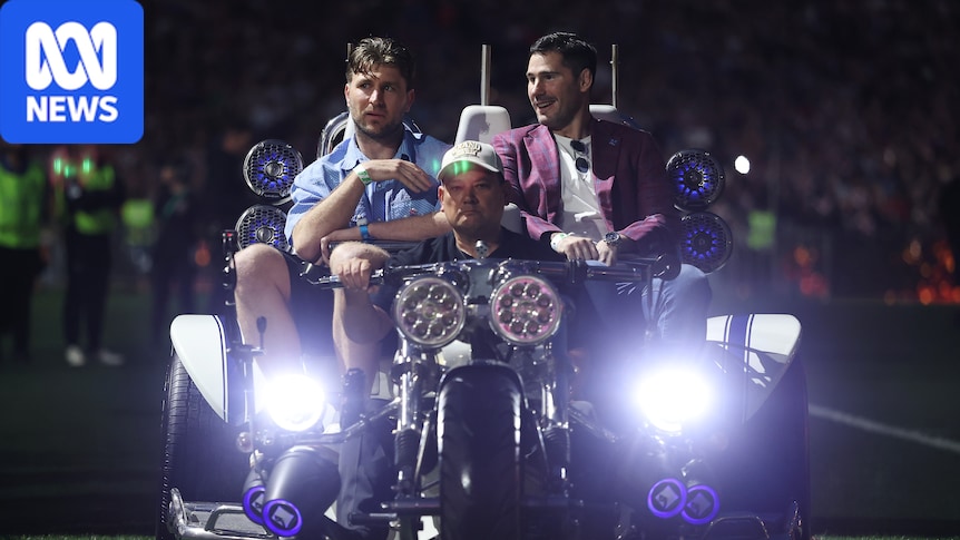 Jai Arrow and Nathan Charles tribute at NRL grand final as Amy Shark leads music group